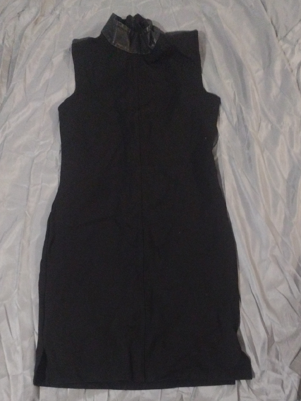 Sleek Black Sleeveless High-Neck Mini Dress